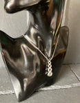 4 Ring Mobius Pendant